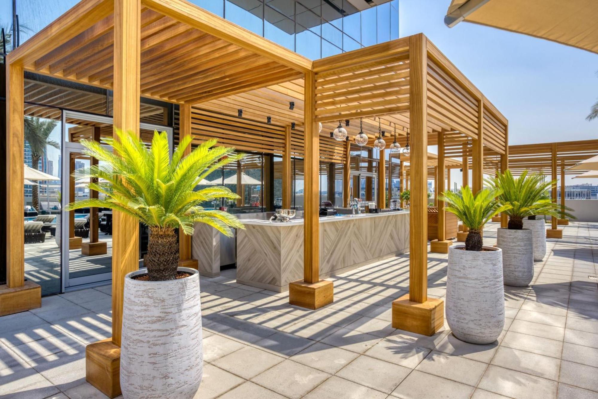The First Collection Dubai Jumeirah Village Circle, A Tribute Portfolio Hotel Exterior foto The hotel's rooftop bar