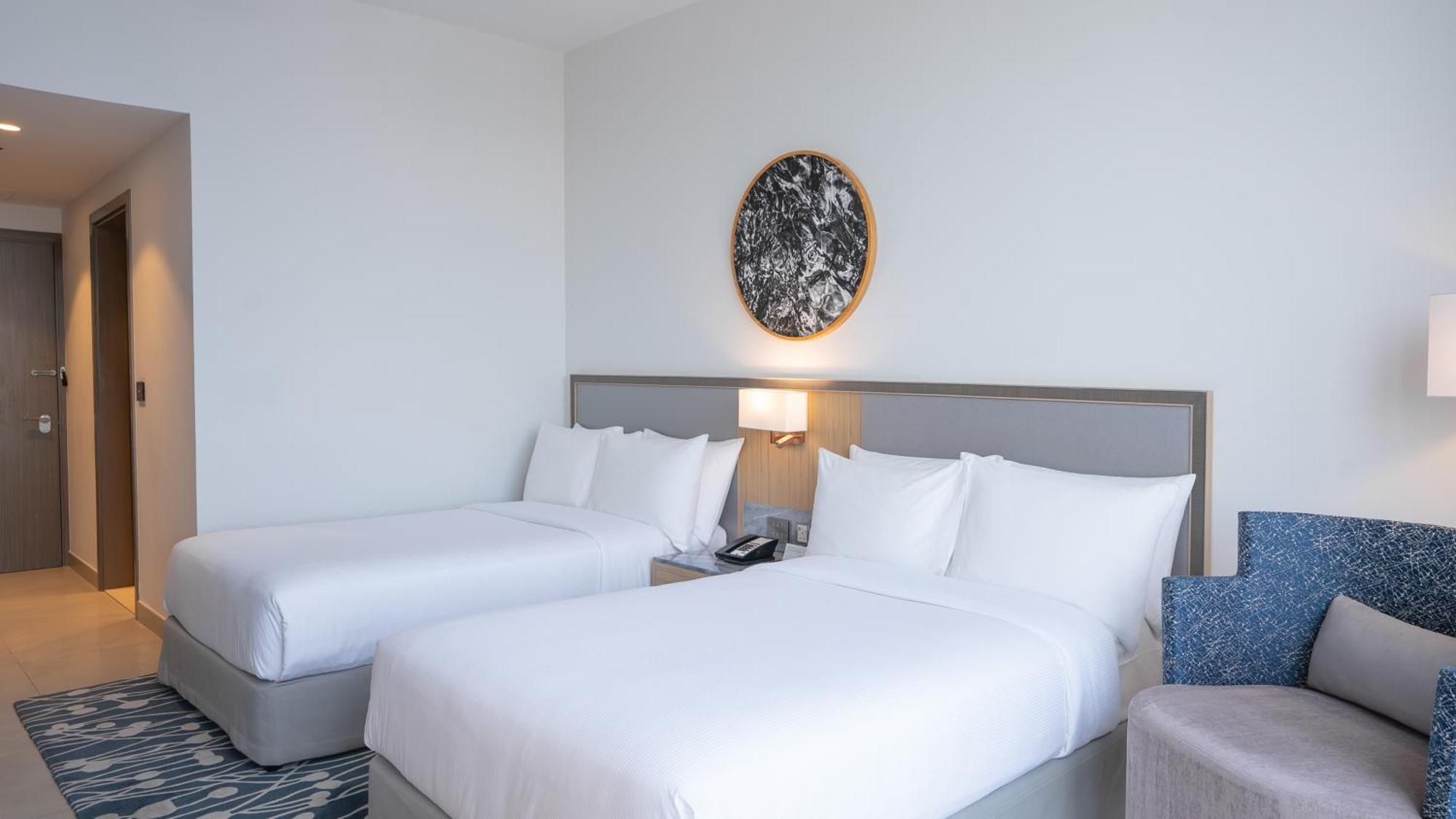 The First Collection Dubai Jumeirah Village Circle, A Tribute Portfolio Hotel Exterior foto Room with two beds