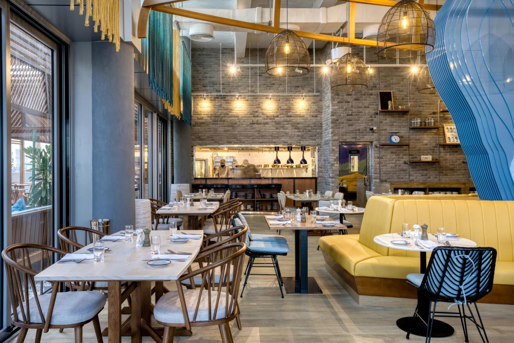The First Collection Dubai Jumeirah Village Circle, A Tribute Portfolio Hotel Exterior foto Interior of the restaurant