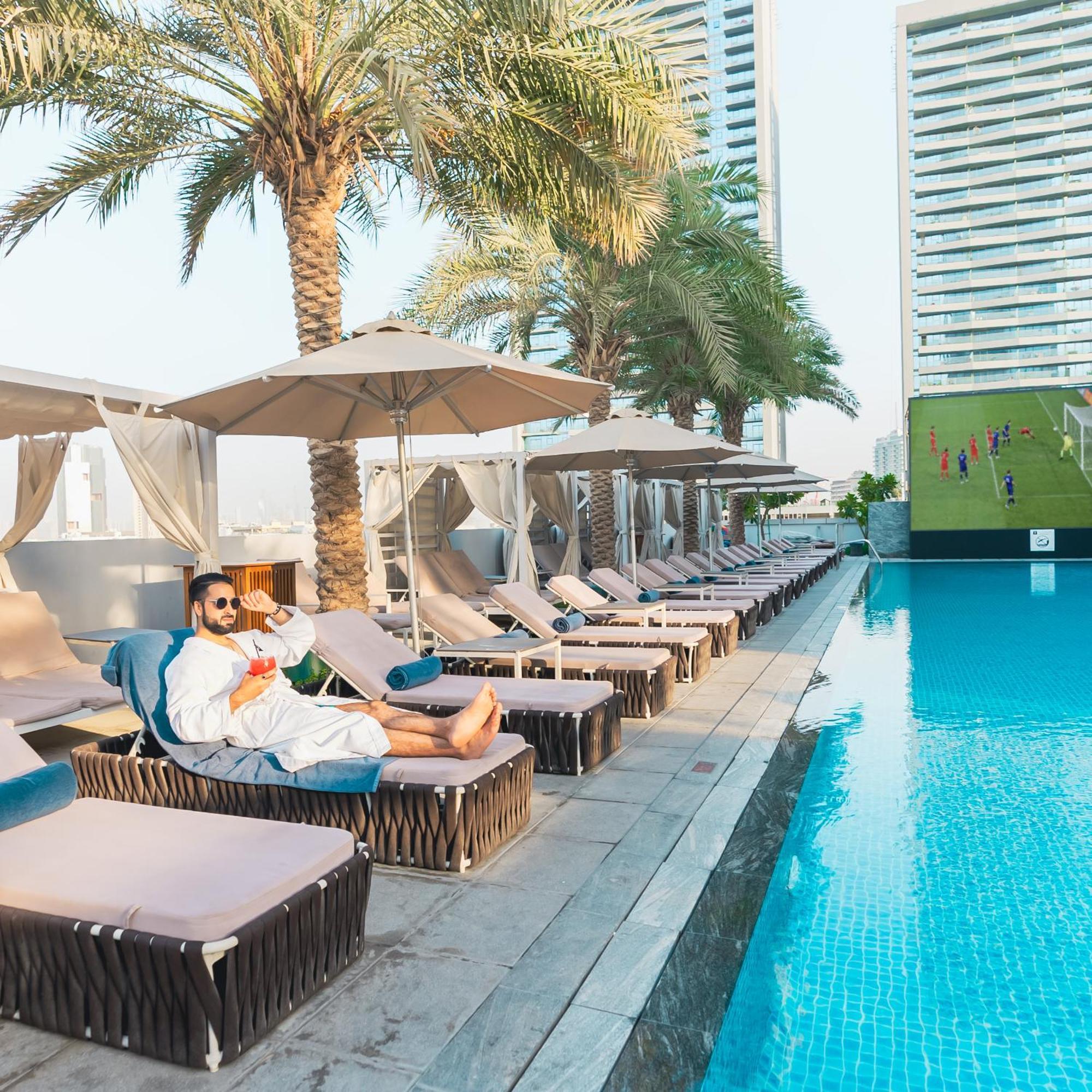 The First Collection Dubai Jumeirah Village Circle, A Tribute Portfolio Hotel Exterior foto "The pool is the best part of the hotel."