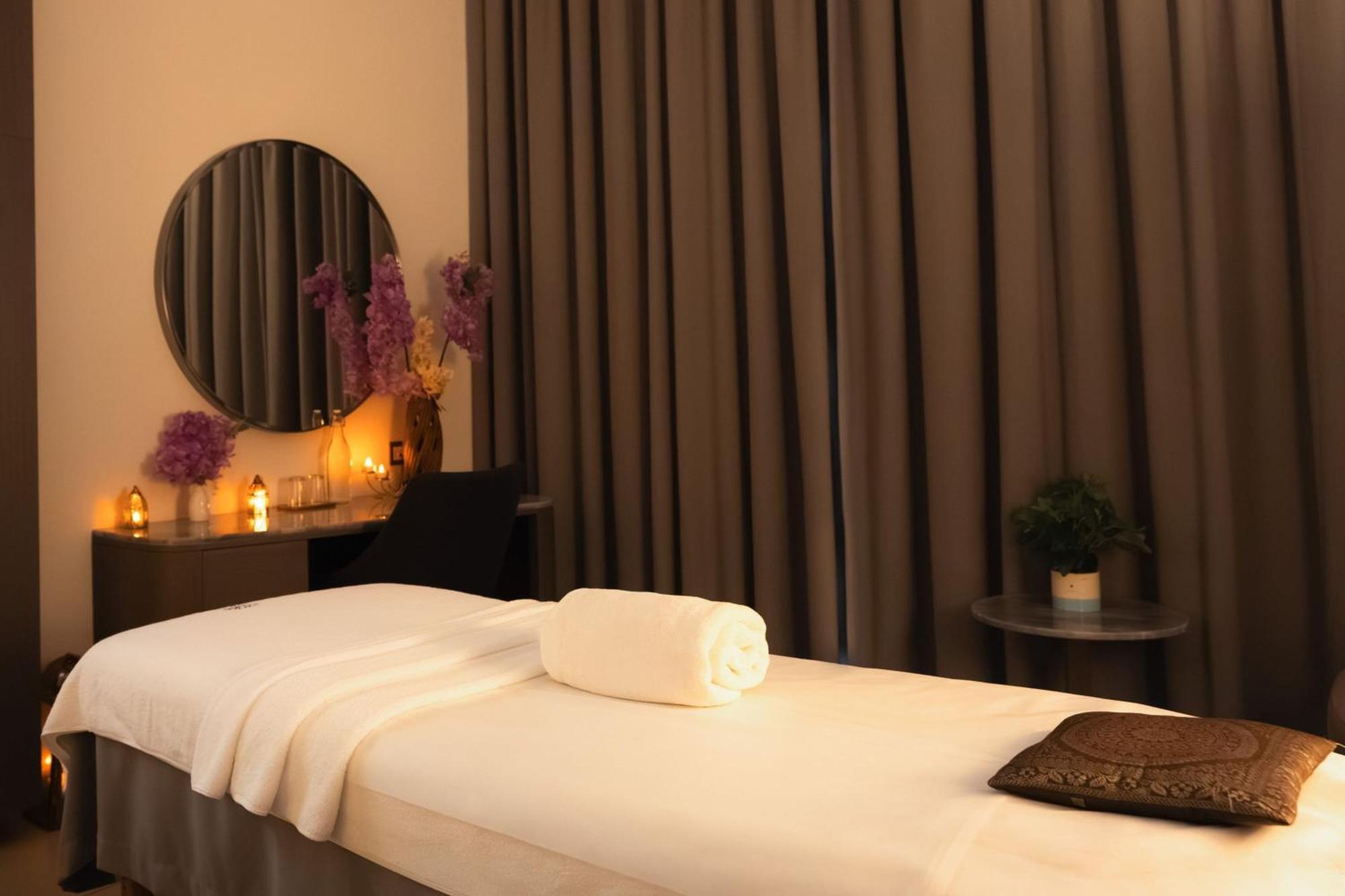 The First Collection Dubai Jumeirah Village Circle, A Tribute Portfolio Hotel Exterior foto A massage table in a spa